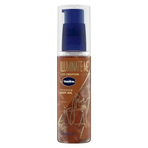 Vaseline Illuminate Me Shimmering Body Oil Created for Melanin Rich Skin. Illuminates Skin with Finishing Touch of Shimmer for Glowing Skin 3.3 oz